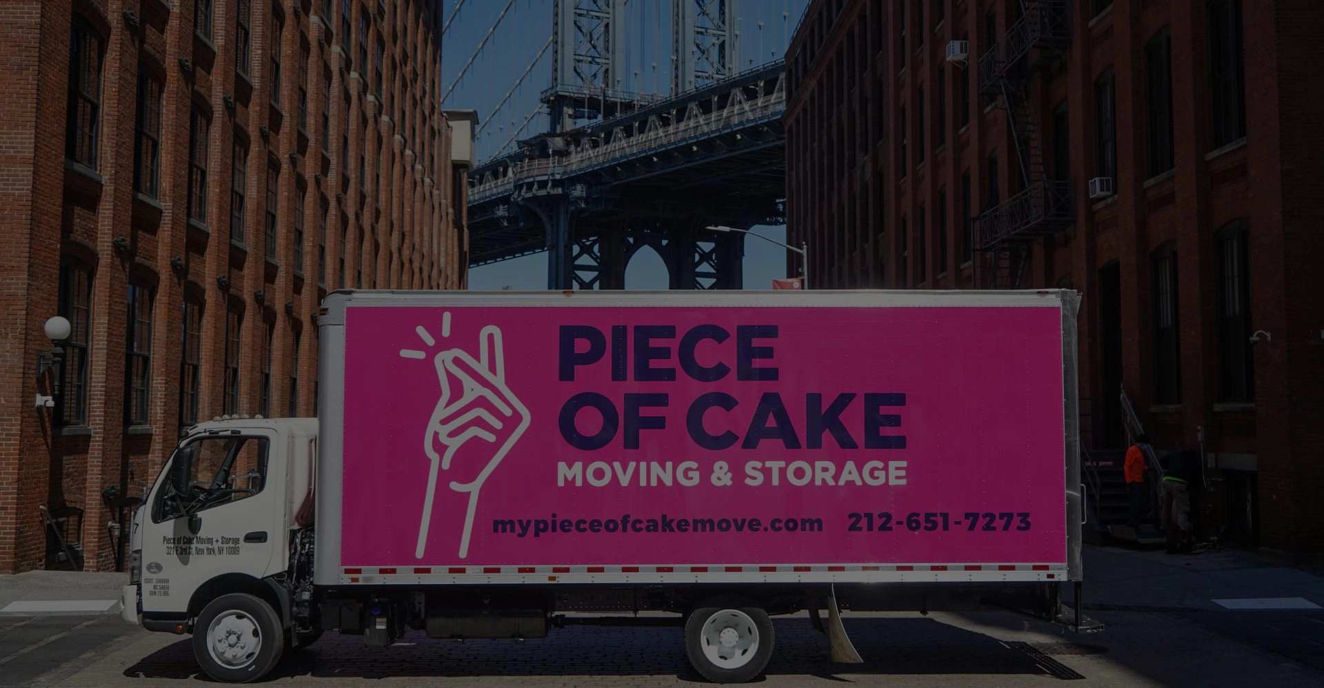 Piece of Cake Moving & Storage truck near Manhattan Bridge