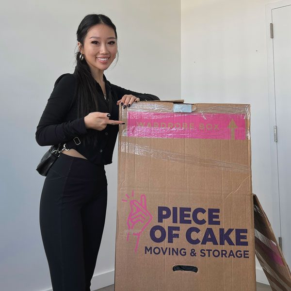 Piece-of-Cake-Customer-holding-boxes-on-moving-day